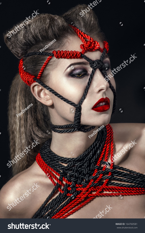 stock-photo-sexy-woman-in-rope-bandage-164760581